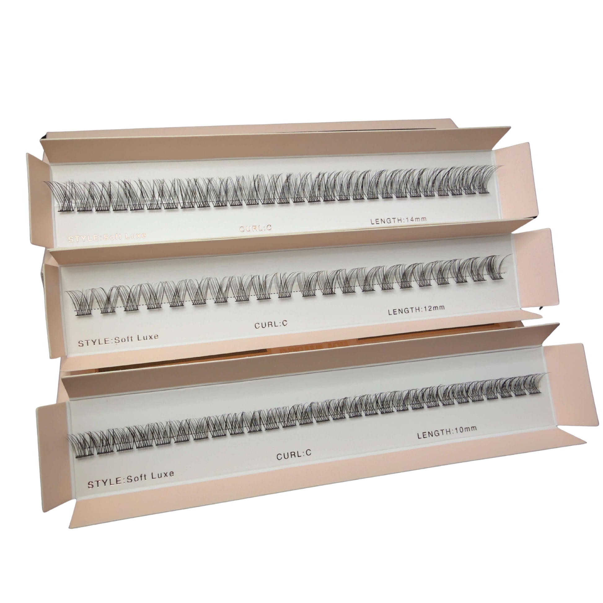 Three boxes of false eyelashes with different styles and lengths on a white background