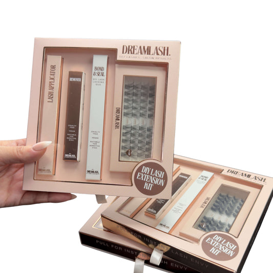 DIY lash extension kit with components displayed in a box, held by a hand.